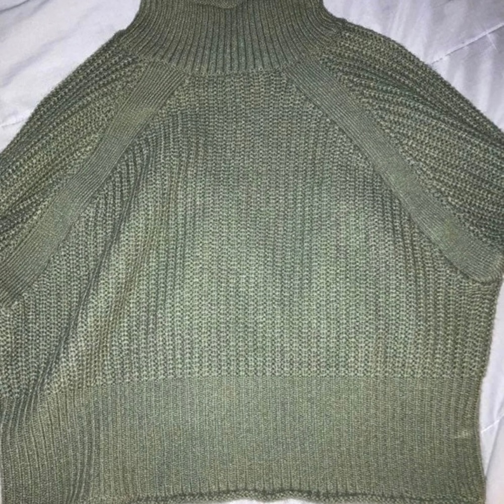 Green turtle neck